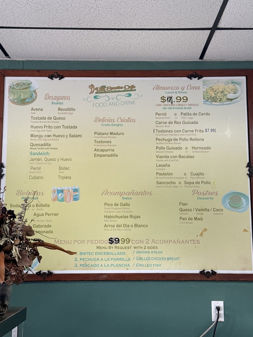 Printed menu with Spanish dish names.
